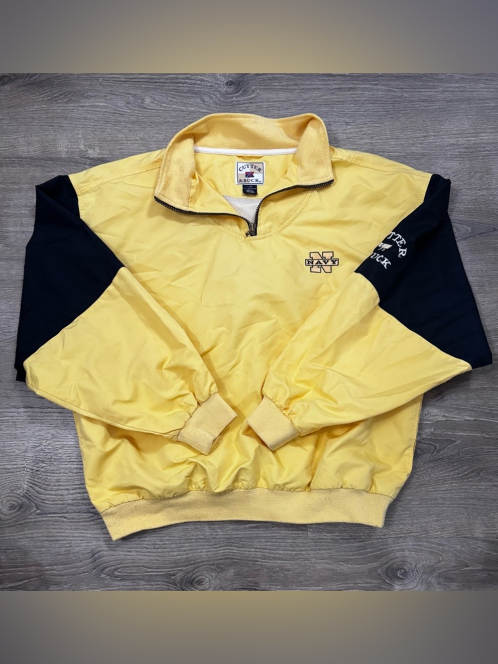 Cutter & Buck Yellow Windbreaker with Navy Logo Patch